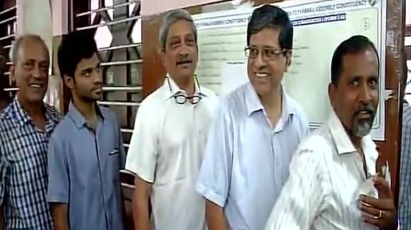 Goa Chief Minister Manohar Parrikar waits in queue to cast his vote in assembly bypoll. (Photo: ANI | Twitter)