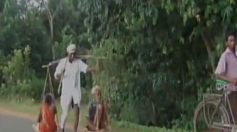 Odisha: Man carries parents on shoulders seeking justice for crime he did not commit