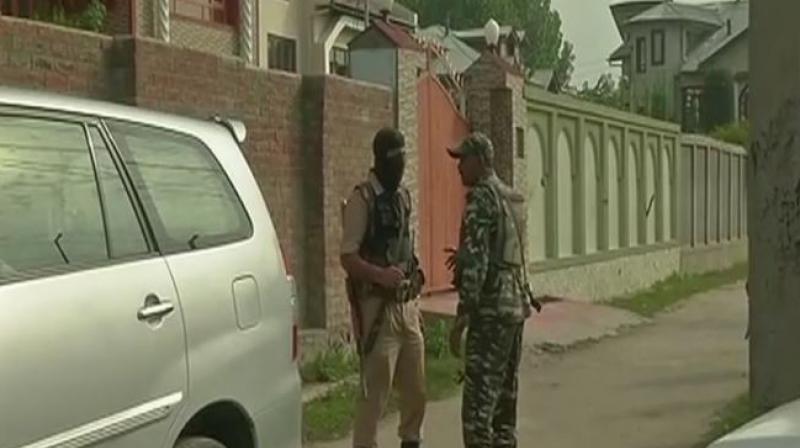 National Investigation Agency (NIA) raids at 11 locations in Srinagar and 5 locations in Delhi, in Jammu and Kashmir terror funding case. (Photo: Twitter | ANI)