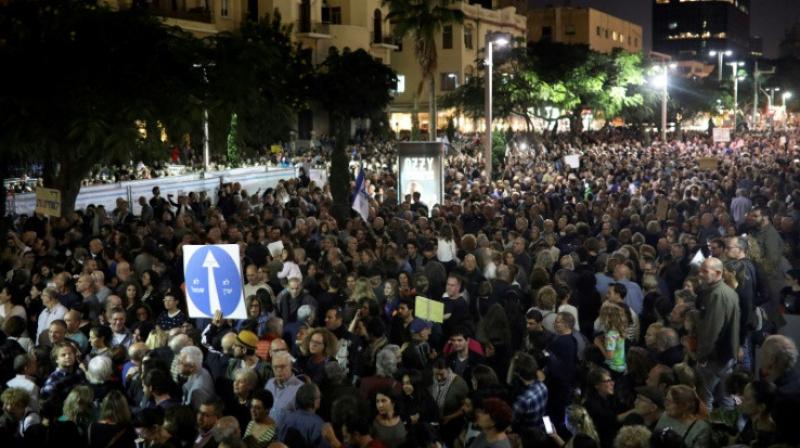 Tens of thousands walk protest march in Israel against govt corruption