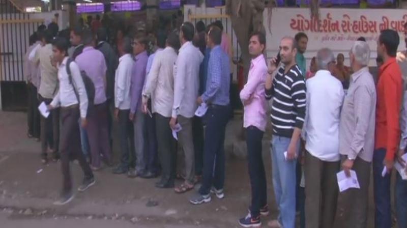After the polling process began at 8 am, people could be seen stepping out of their houses despite the cold weather and queuing up to cast votes at polling stations.. (Photo: ANI | Twitter)
