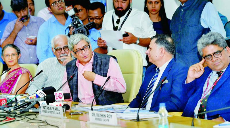 Bibek Debroy, chairman, Economic Advisory Council to the Prime Minister (EAC-PM) with members Ratan P. Watal, Rathin Roy, Surjit Bhalla and Ashima Goyal during a press conference in New Delhi on Wednesday. (Photo: PTI)