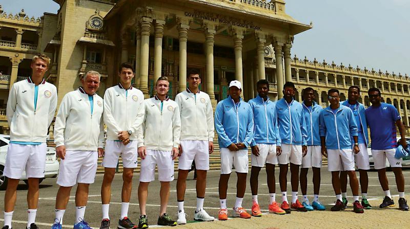 The India and Uzbekistan team members during the draw ceremony at the Vidhana Soudha on Thursday. (Photo: AP)