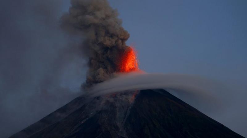 Volcanic ash has darkened the skies over nearby villages in coconut-growing Albay province, where Mayon lies. (Photo: AP)