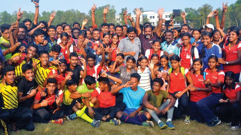 Palakkad team that won the overall championship in the 60th state school athletic championship at CH Muhammad Koya Stadium in Thenhipalam on Tuesday. (Photo:  VENUGOPAL)