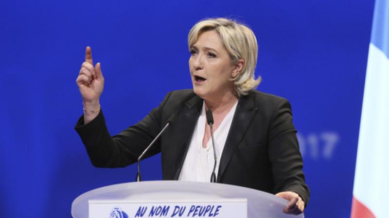 The European Parliament lifted French far-right leader Marine Le Pens immunity from prosecution for tweeting gruesome images of violence. (Photo: AP)