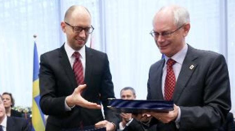 Former European Union President Herman van Rompuy, right. (Photo: AFP)