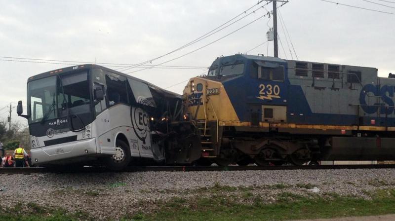 A freight train smashed into a charter bus in Biloxi, Mississippi, pushing the bus 300 feet down the tracks authorities said. (Photo: AP)