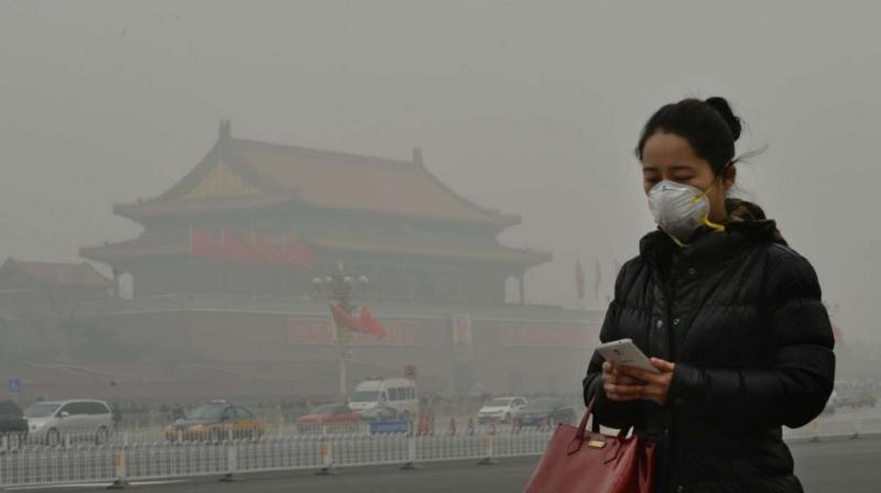 A red alert, issued when severe smog is expected to last more than 72 hours, is the highest of Beijings four-tiered, colour-coded warning system. (Photo: Representational Image/AFP)