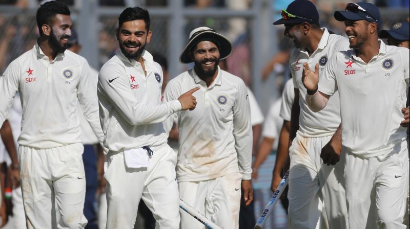 R Ashwin ran through Englands lower-order as Virat Kohli and Co. won the Mumbai Test by an innings and 36 runs. (Photo: PTI)