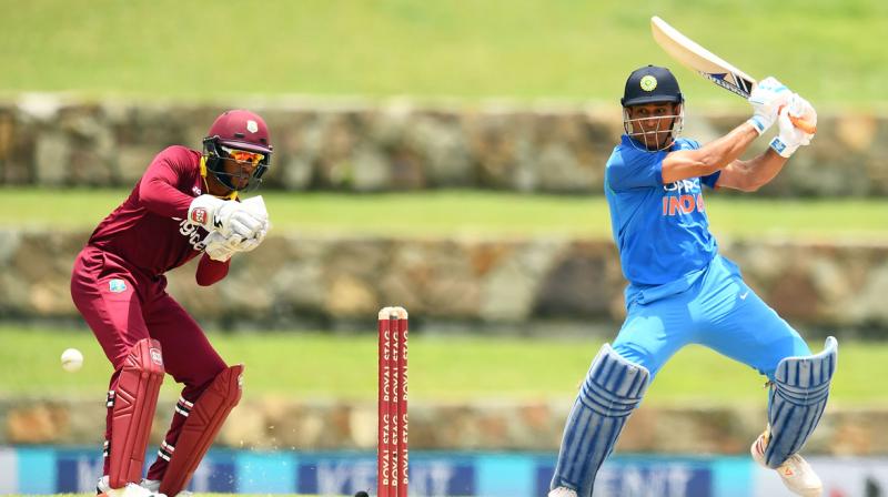 MS Dhoni scored unbeaten 78 to set up Indias 93-run win over West Indies in the 3rd ODI of 5-match series. (Photo: AFP)