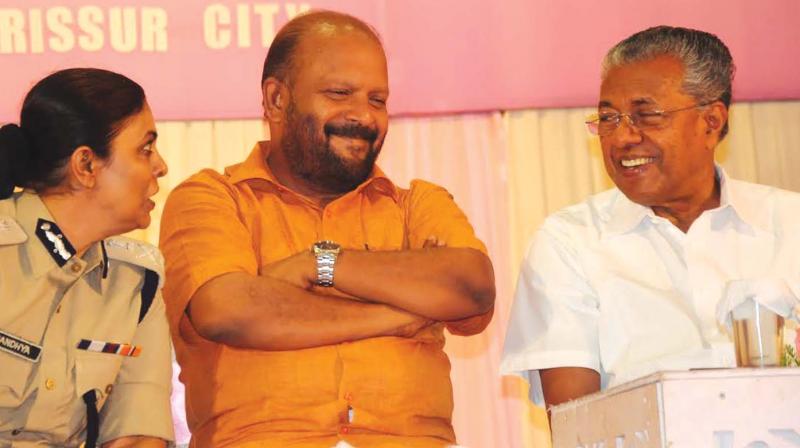 Chief Minister Pinarayi Vijayan, Agriculture Minister V.S. Sunilkumar and ADGP B. Sandhya during the Pink Police Petrol programme in Thrissur on Monday. (Photo: ANUP K VENU)