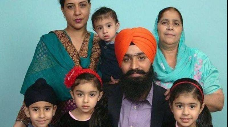 Manjinder Singh, a friend of Jaspreet Singh (centre), said he was a devoted husband and father of four. (Photo: @unitedsikhs | Twitter)