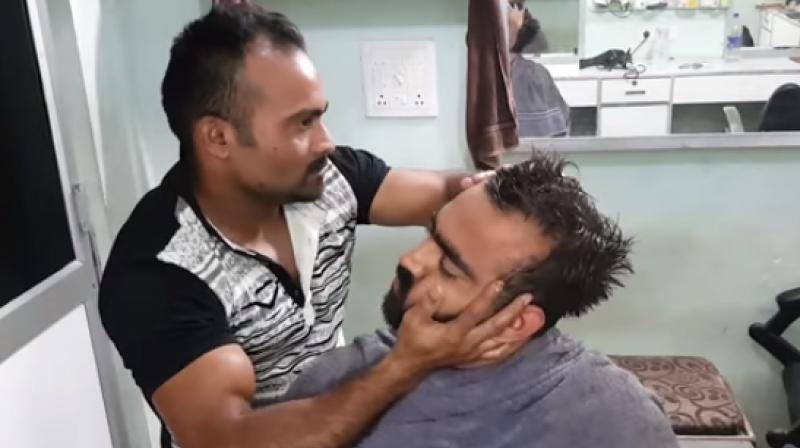 Neck crack by barber causes nerve damage for one customer. (Photo: Youtube screengrab)