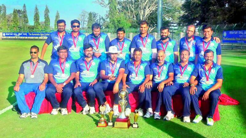 Andhra Pradesh and Telangana High Court Lawyers Pose with the trophy after defeating Supreme Court to win the All-India Lawyers Cricket Tournament that was played recently at Mysore in Karnataka.