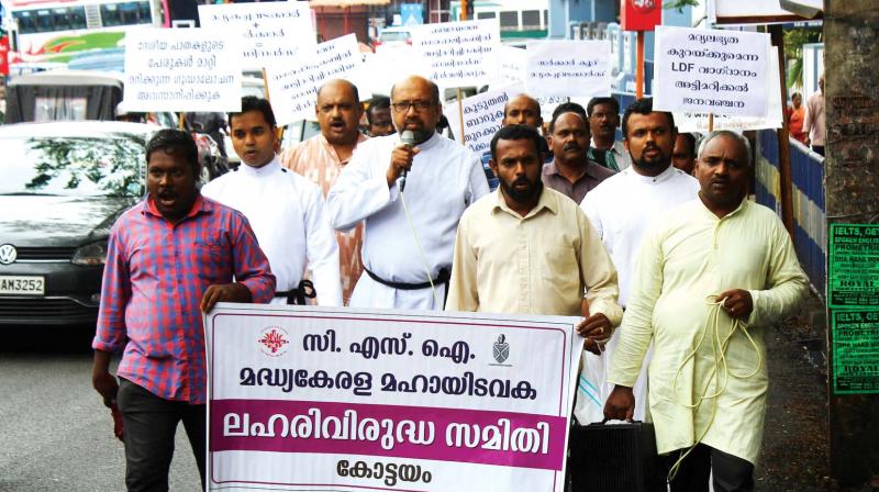 Anti-narcotic division of CSI church takes out a rally against opening of liquor shops in Kottayam on Monday. (Photo: RAJEEV PRASAD)