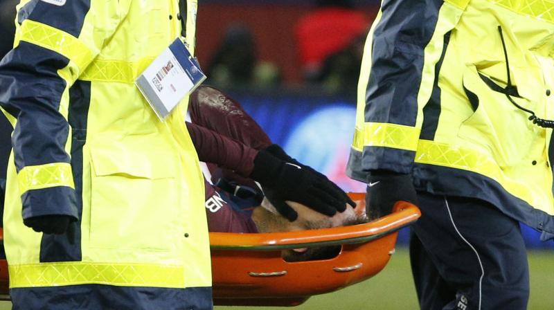 Neymar appeared to be in tears as he was stretchered off the field at the Parc des Princes on Sunday. (Photo: AFP)