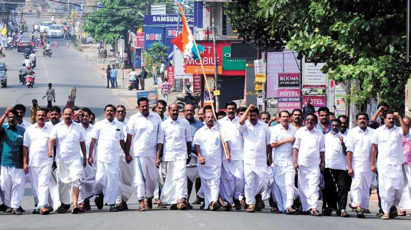Congress workers take out a march demanding the arrest of the accused in Wadakkanchery gang-rape case in Thrissur on Saturday. (Photo: DC)