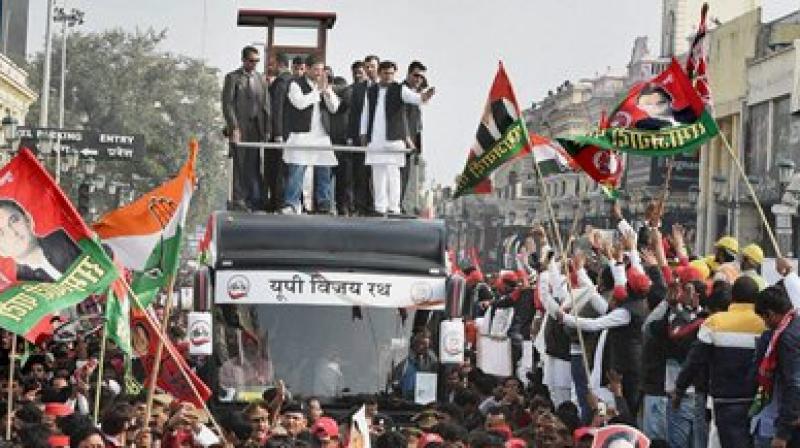 Reflecting camaraderie and personal bonding, the scions of Congress and Samajwadi Party showcased themselves as the two wheels of a bicycle. (Photo: PTI)