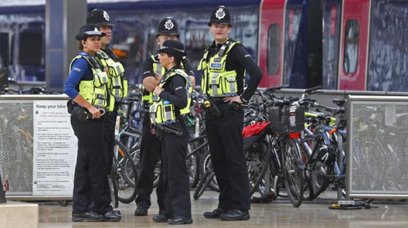 Police provide security at Paddington mainline train station in London, after a terrorist incident was declared at nearby Parsons Green subway station Friday (Photo: AP)