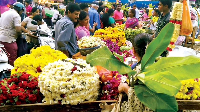 Women, who headed to markets to buy flowers for decorating Ganesha idols,  were in for a shock on Thursday as their prices had doubled 	 KPN