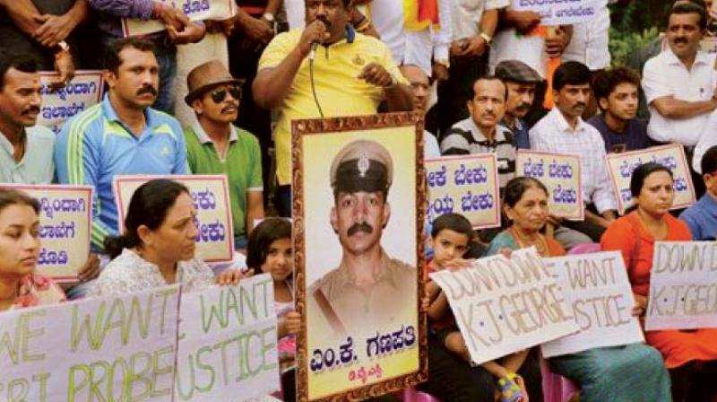 A file photograph of a protest soon after the suicide of DYSP M.K. Ganapathi demanding a fair and impartial probe into the incident