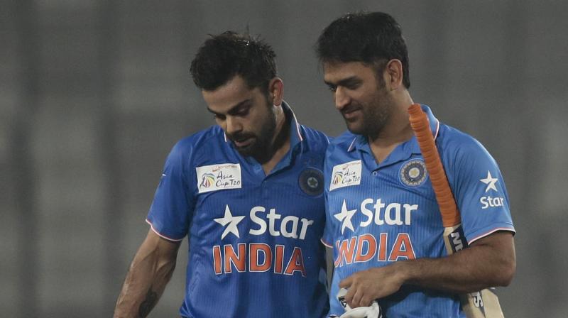 Obviously, he will always be my captain. He will always be the person who guided me initially, who gave me opportunity, who gave me ample space and ample time to grow as a cricketer,  said Virat Kohli as he lauded MS Dhoni. (Photo: AP)