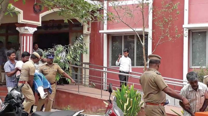 Police bring CD Mani and his associates to Alandur Court, on Monday. (Photo: DC)