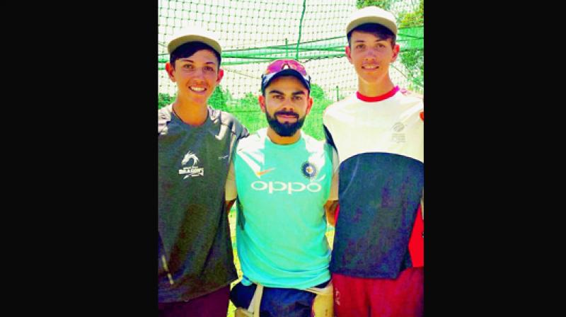 South Africas twin brothers, Duan and Marco Jansen, with India captain Virat Kohli. (Photo: DC)