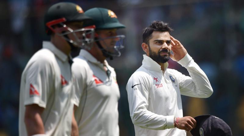 Kohli was on a sledging spree on day two of the second Test in Bangalore. After frequent exchanges between Kohli and Steven Smith, the India skipper tried to unnerve opener Matt Renshaw by reminding him of the \toilet break\ he took in the Pune Test. (Photo: AP)
