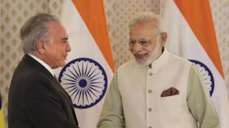 Modi said India will continue to work with Brazil as an important partner in early adoption of the Comprehensive Convention on International Terrorism (CCIT). (Photo: AP)