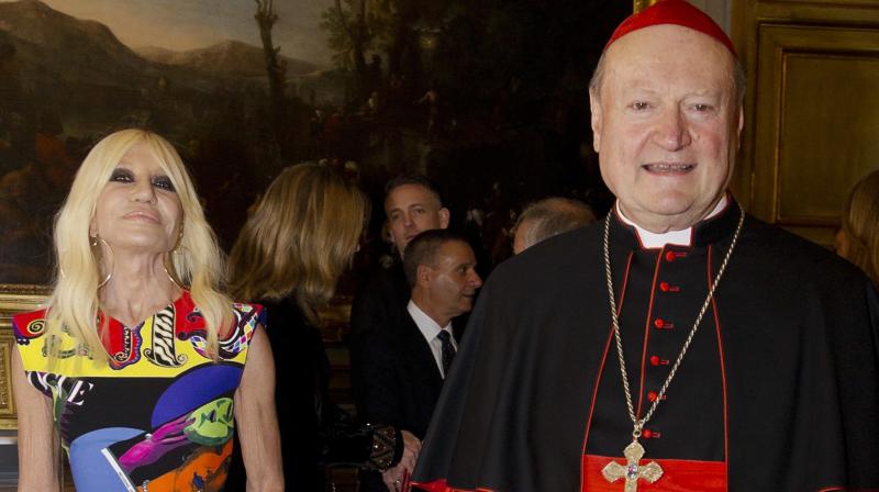 Cardinal Gianfranco Ravasi and designer Donatella Versace arrive at Palazzo Colonna in Rome, Monday, Feb. 26, 2018. (Photo: AP)
