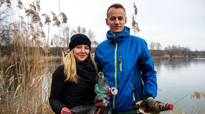 The idea is that anyone who picks up at least one item of trash a day qualifies as a Wastebuster. (Photo: AFP)