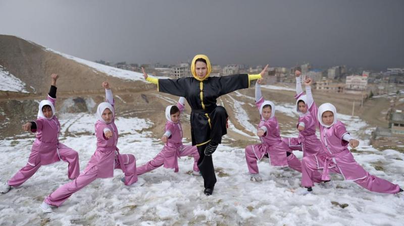 Determined to succeed: Afghan girls learn Wushu martial art