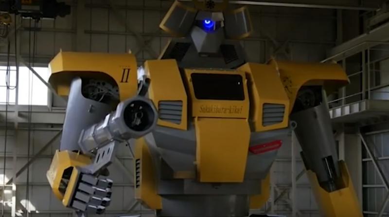 It contains a cockpit with monitors and levers for the pilot to control the robots arms and legs.