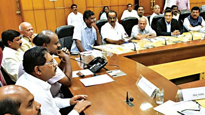 Chief Minister H.D. Kumaraswamy and Deputy Chief Minister G Parameshwar at a meeting of sugar factory owners in Bengaluru on Thursday 	Image: DC
