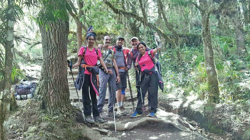 Anjali (left) with her family during the climb