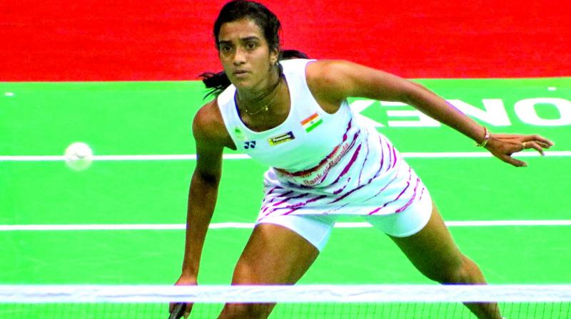 P.V. Sindhu en route to her 21-18, 14-21, 21-14 win over South Koreas Sung Ji Hyun in their Yonex-Sunrise India Open semi-final in New Delhi on Saturday.(Photo: BIPLAB BANERJEE)