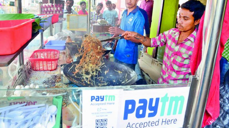 Cashless business starts at fast food centers in Nellore city on Friday. (Photo: DC)