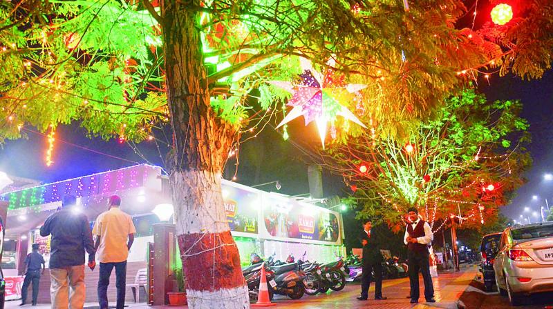 Hotels are decked up with illumination as the city gears up for the New Years Eve celebrations in Visakhapatnam on Friday. (Photo: DC)