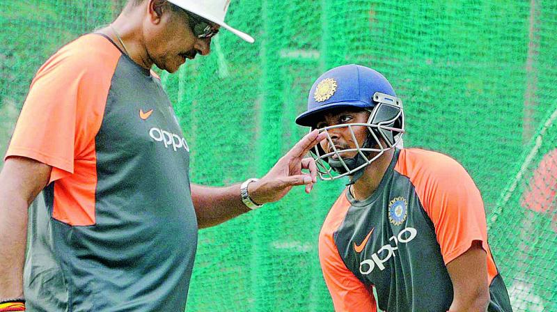 India coach Ravi Shastri with Prithvi Shaw during a training session in Hyderabad on Wednesday (Photo: DC)