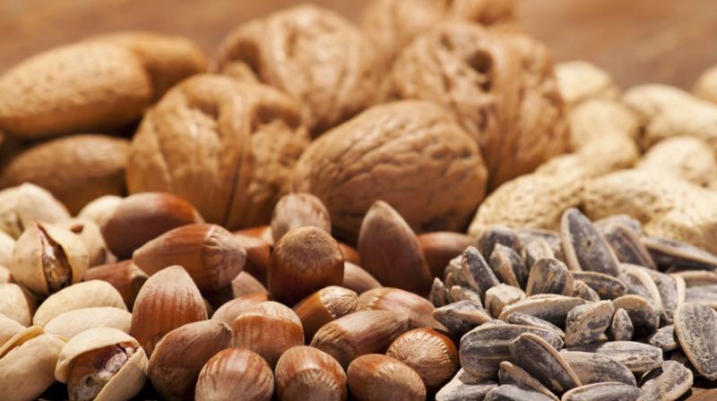 Many people have historically assumed that nuts - an energy-dense, high-fat food - are not a good choice for individuals who want to lose weight (Photo: AFP)
