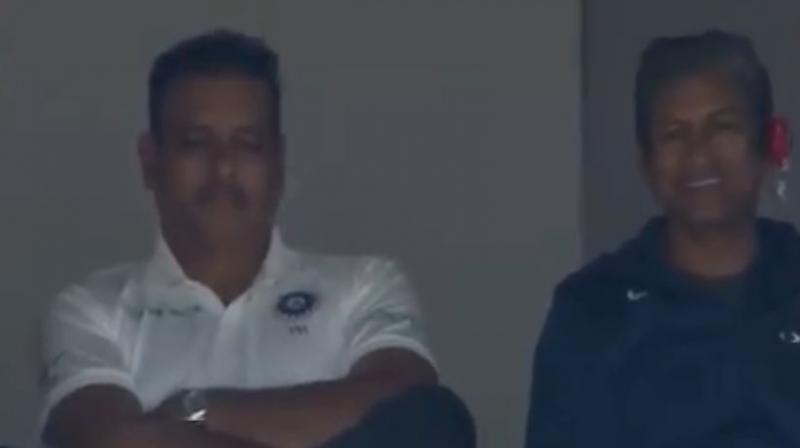 The Indian off-spinner was in conversation with assistant coach Sanjay Bangar via a connected earpiece, who was seated beside Shastri. (Photo: Screengrab/Twitter)