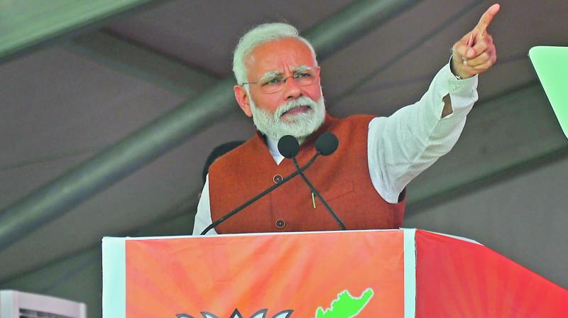 Prime Minister Narendra Modi addresses a BJP rally in Guntur on Sunday. (Photo: Tejo Roy)