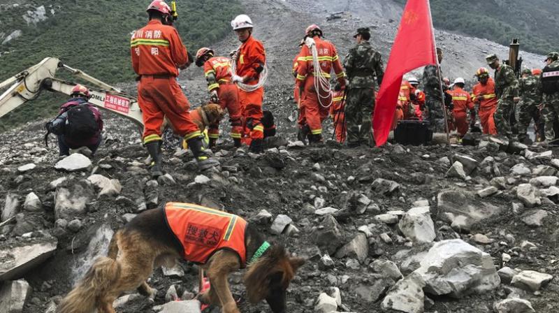 Chinese crews recovered nine bodies and were still searching for 109 others on Sunday, , a day after a massive landslide buried a picturesque mountain village in China.