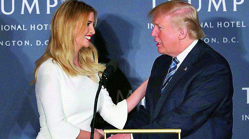 Republican presidential candidate Donald Trump and his daughter Ivanka Trump during the opening of Trump International Hotel in Washington.