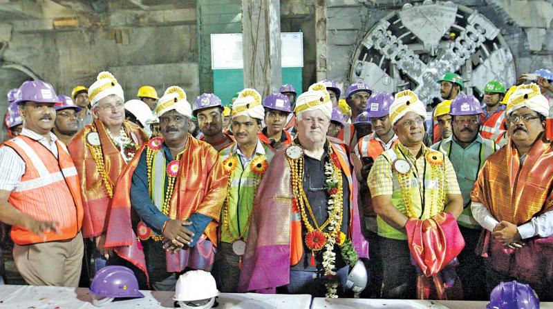Officials of CMRL and Afcons cheer after breakthrough of the 28th underground tunnel on Friday. This was the last underground tunnel to be made on  Washermanpet  Chennai Central route using the heavy tunnel  boring machines.