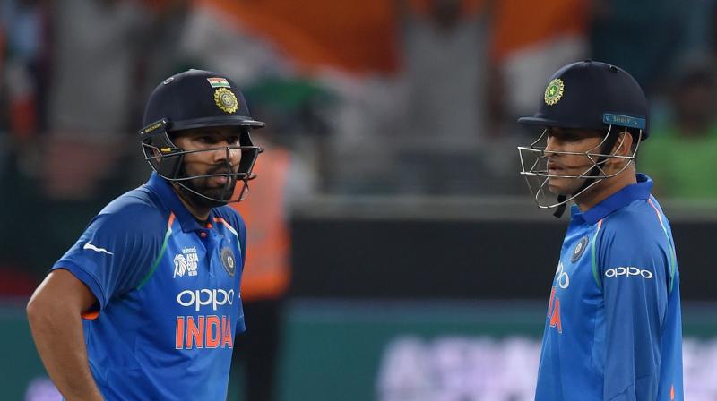 \Whatever I have seen of him (Dhoni) leading the side for all these years, he never panicked, took time while taking decisions. There are those similarities in me too,\ skipper Rohit told mediapersons on Saturday. (Photo: AFP)