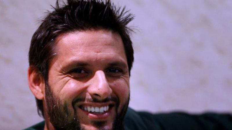 Shahid Afridi asked a group of Indian fans to hold the Indian flag properly and the video of the same has gone viral and the Indian Twitter users have loved Afridis gesture. (Photo: PTI)