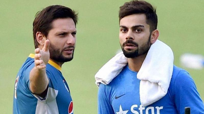 \My relationship with Virat is not dictated by political situation. Virat is a fantastic human being and an ambassador of cricket for his country, just like I am for my country,\ said Shahid Afridi. (Photo: PTI)